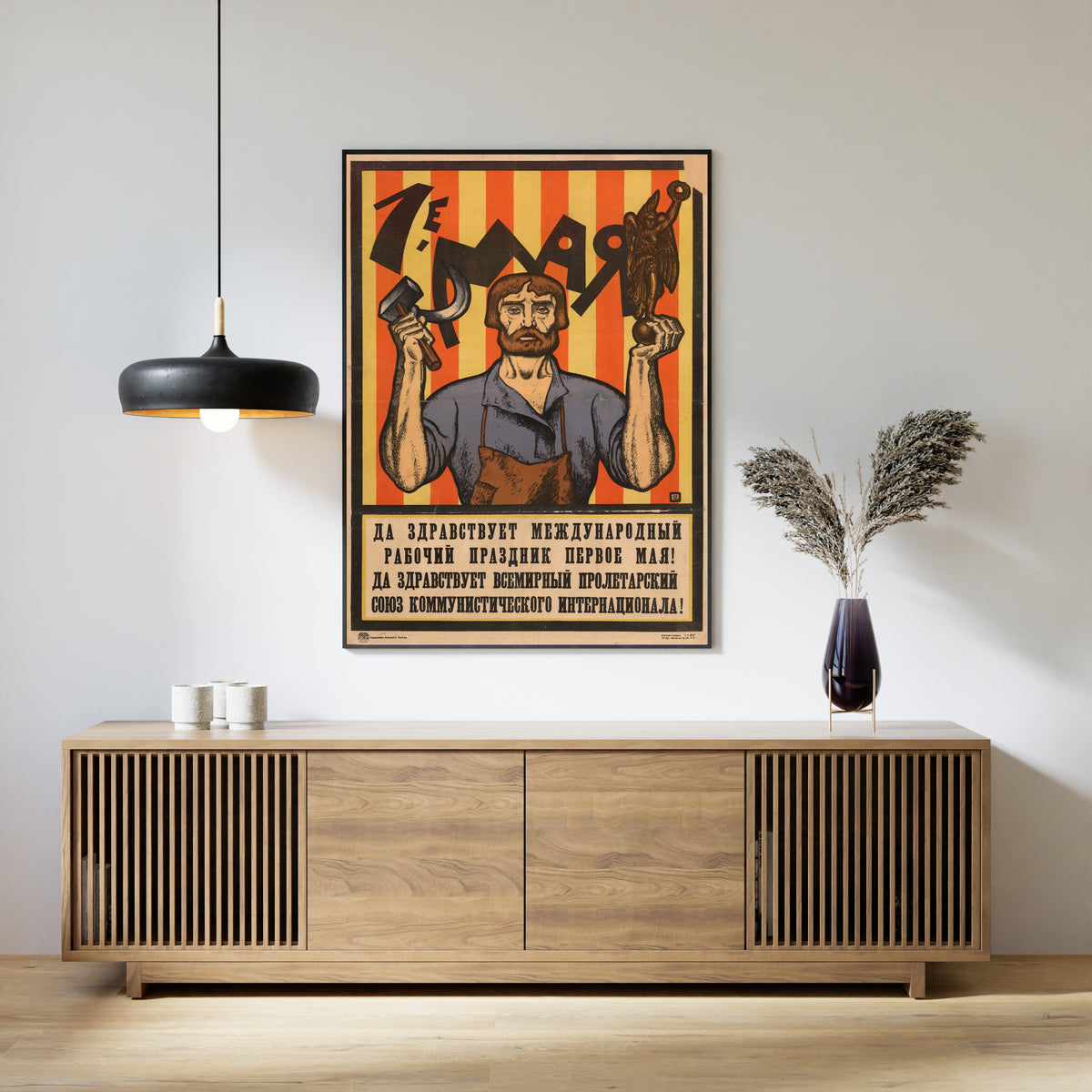 Framed art print of 1st of May. Long Live the International Workers' Holiday, the First of May! by Sergey Ivanov, above a slatted wood sideboard