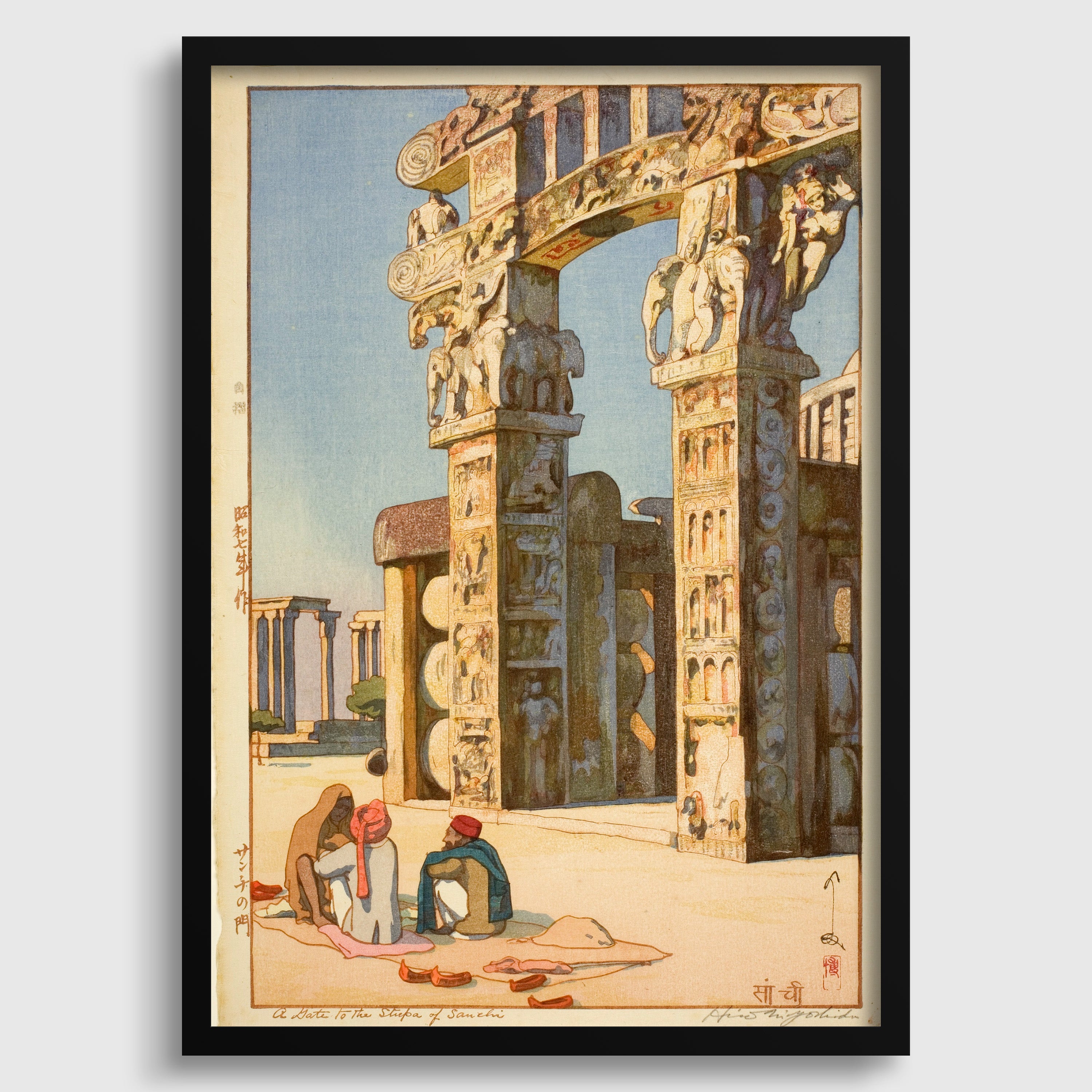 The image is a framed print depicting an ornate, ancient architectural structure with intricate carvings and statues. Two individuals are seated on the ground in front of the structure, which appears to be a temple or monument. The overall scene conveys a sense of history and cultural significance.