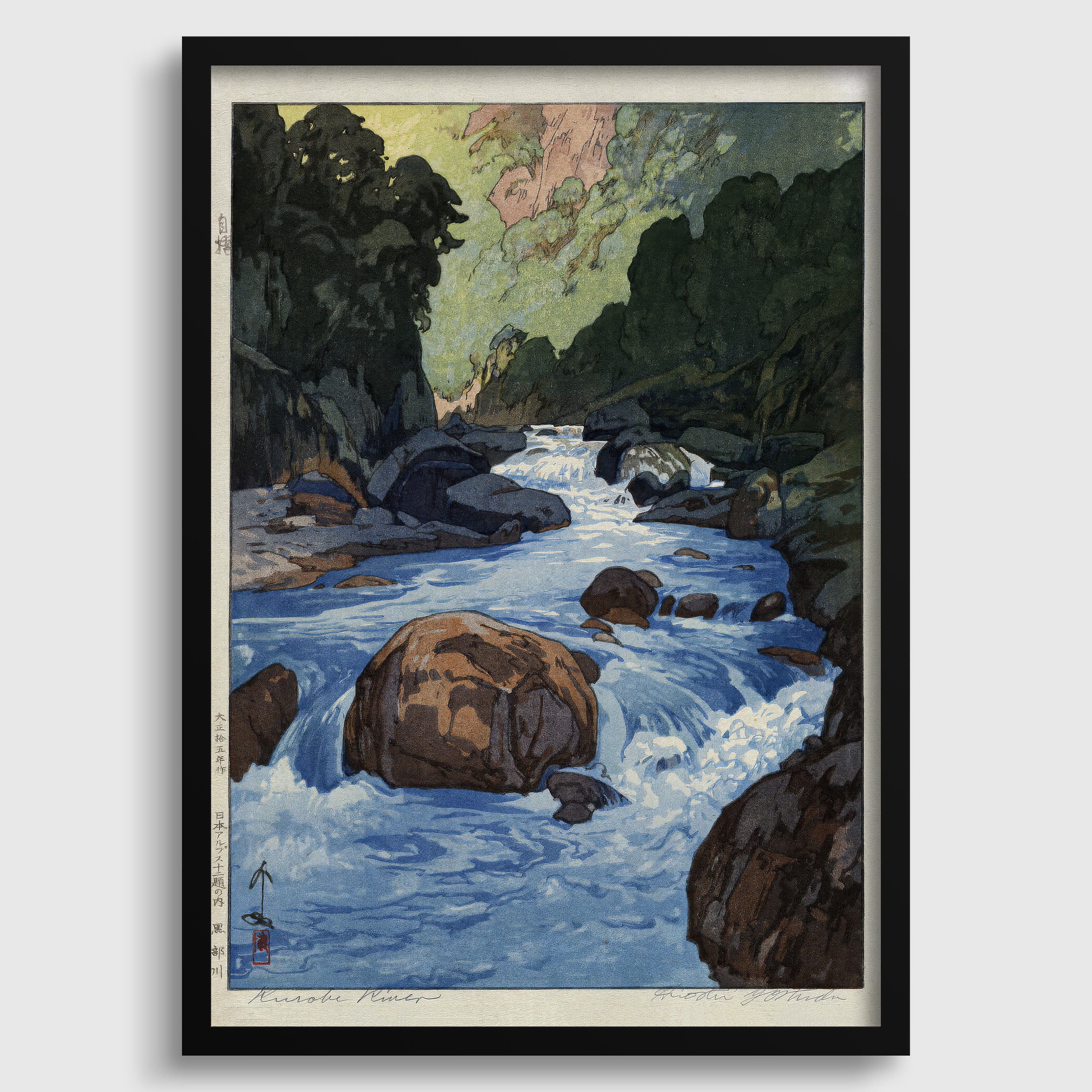 The image is a framed print depicting a serene landscape with a flowing river surrounded by lush greenery and rocky terrain.