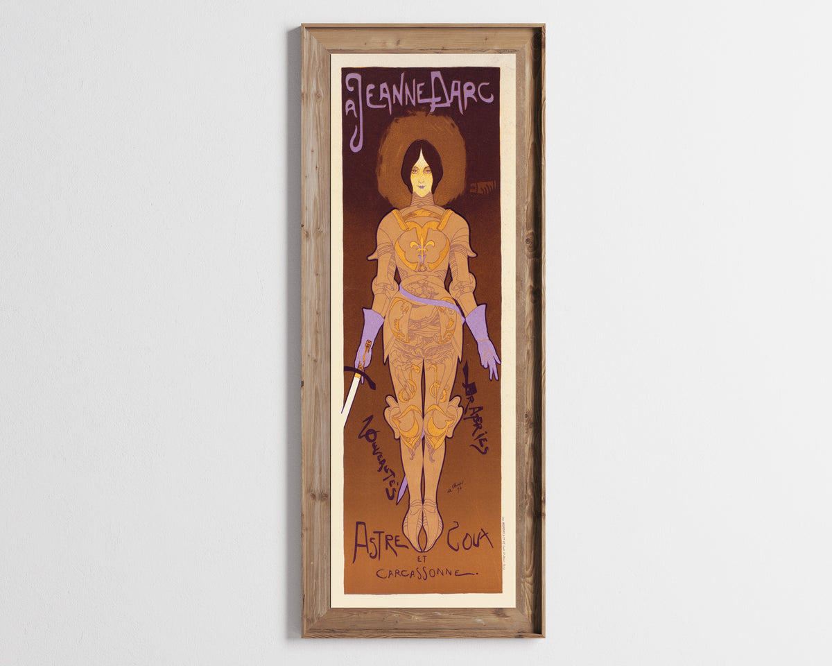 Framed art print of A Jeanne d'Arc by Georges de Feure, in a tall wooden frame on a pale wall