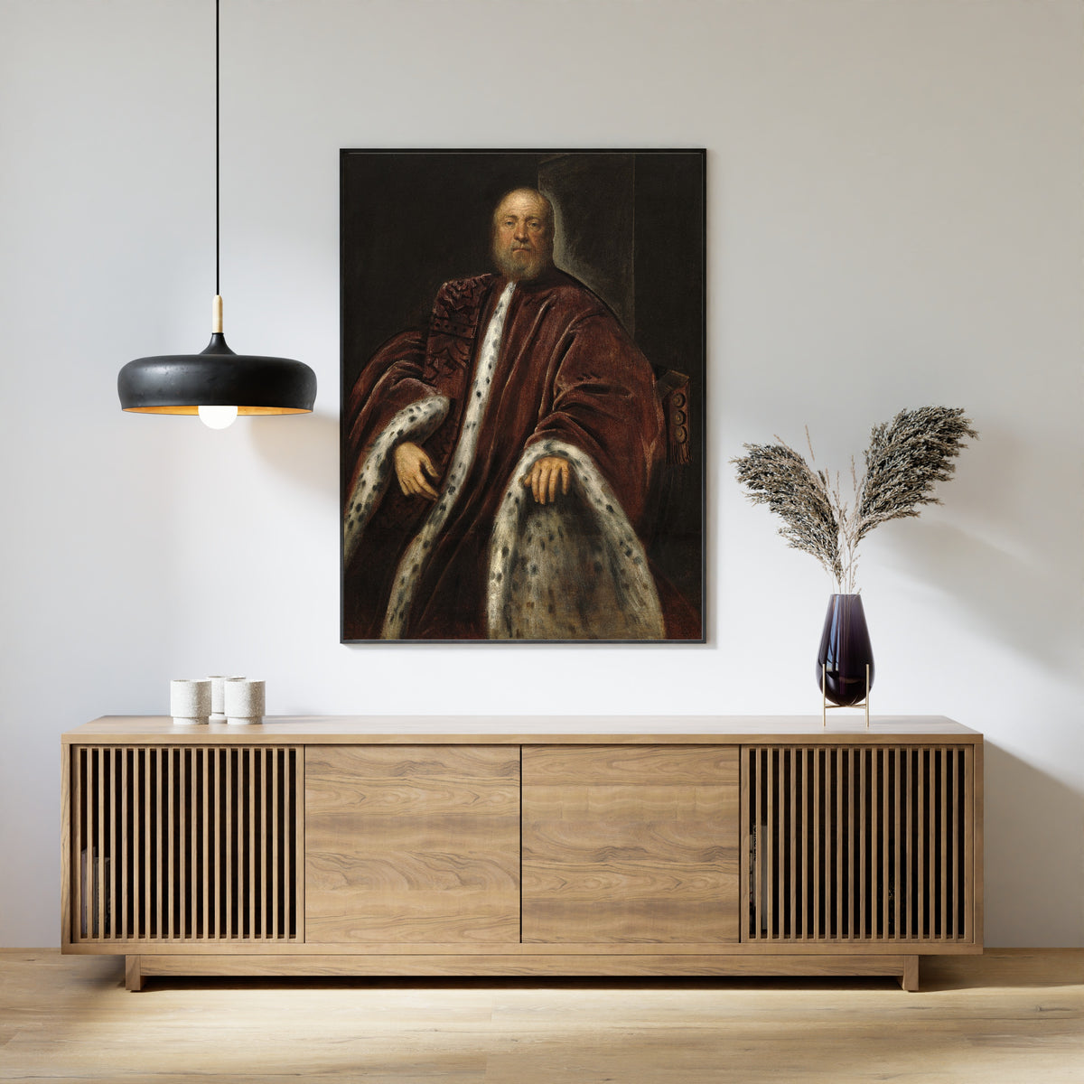 Framed art print of A Procurator of Saint Mark’s by Tintoretto, above a slatted wood sideboard