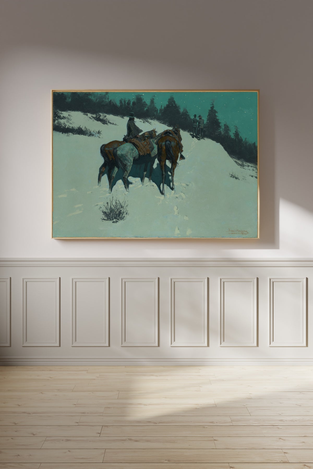 A Reconnaissance by Frederic Remington — framed on a panelled wall in afternoon light