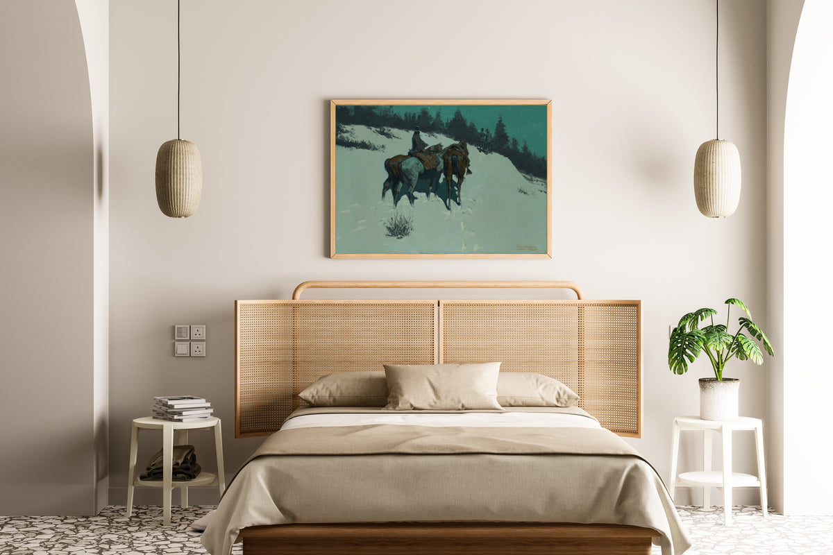 A Reconnaissance by Frederic Remington — framed above a cane-headboard bed