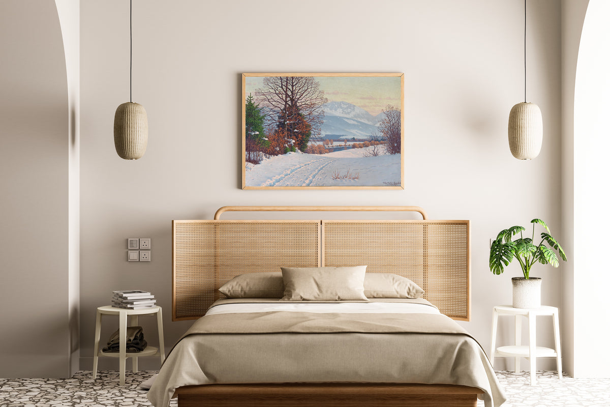A Sunny Winter Day by Fritz Müller-Landeck — framed above a cane-headboard bed
