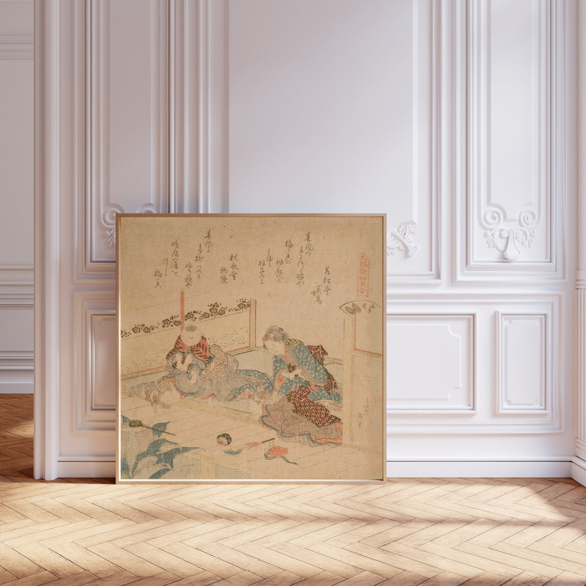 Framed art print of Abalone by Katsushika Hokusai, leaning against pale pink panelling on a herringbone floor