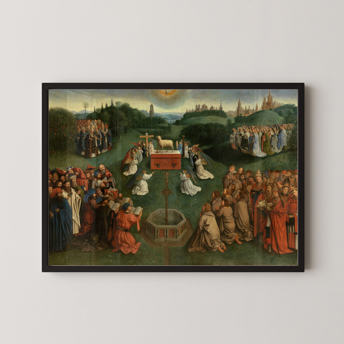 Framed art print of Adoration of the Lamb by Jan van Eyck, in a black frame on a pale wall