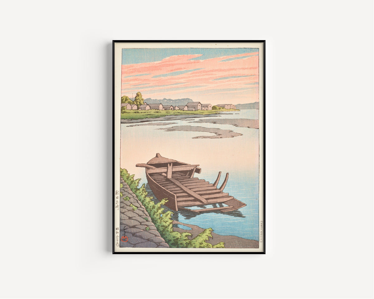 Framed art print of Akita Tsuchizaki by Kawase Hasui, in a slim black frame on a plain white wall