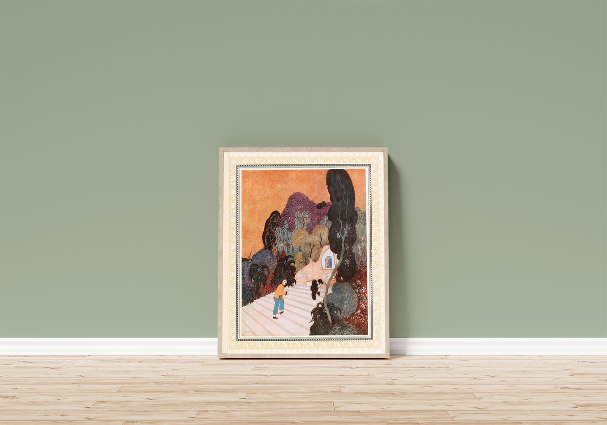 Framed art print of Aladdin finds the Magic Lamp by Edmund Dulac, in a light wood frame leaning on a sage green wall above a wooden floor