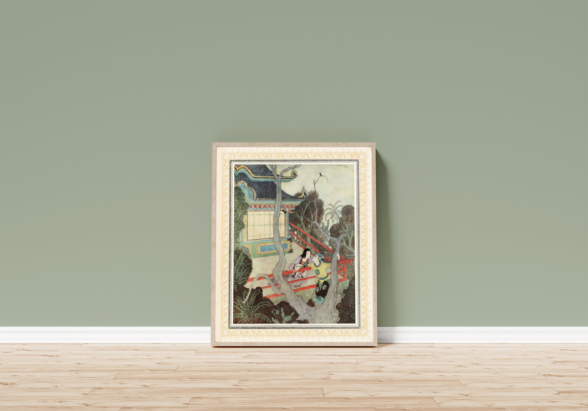 Framed art print of Aladdin finds the Princess in Africa by Edmund Dulac, in a light wood frame leaning on a sage green wall above a wooden floor