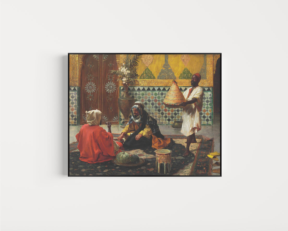 Framed art print of An Afternoon Discussion by Rudolf Ernst, in a slim black frame on a plain white wall