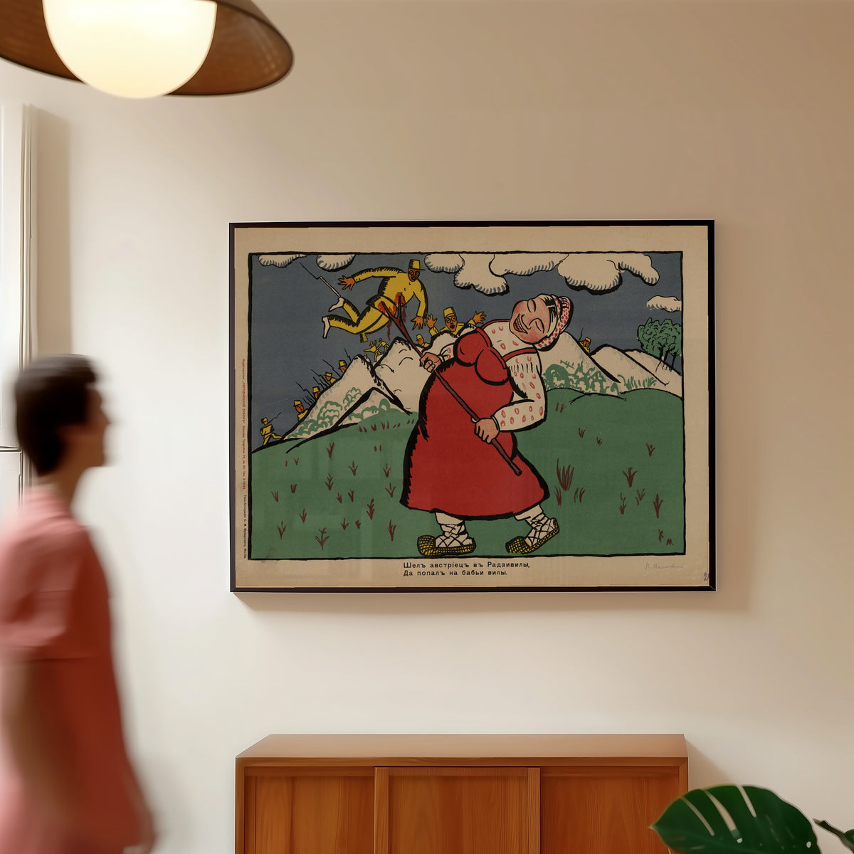 Framed art print of An Austrian Walked into Radziwiłłów and Landed on a Peasant… by Kazimir Malevich, in a slim black frame on a warm wall in a sunlit room