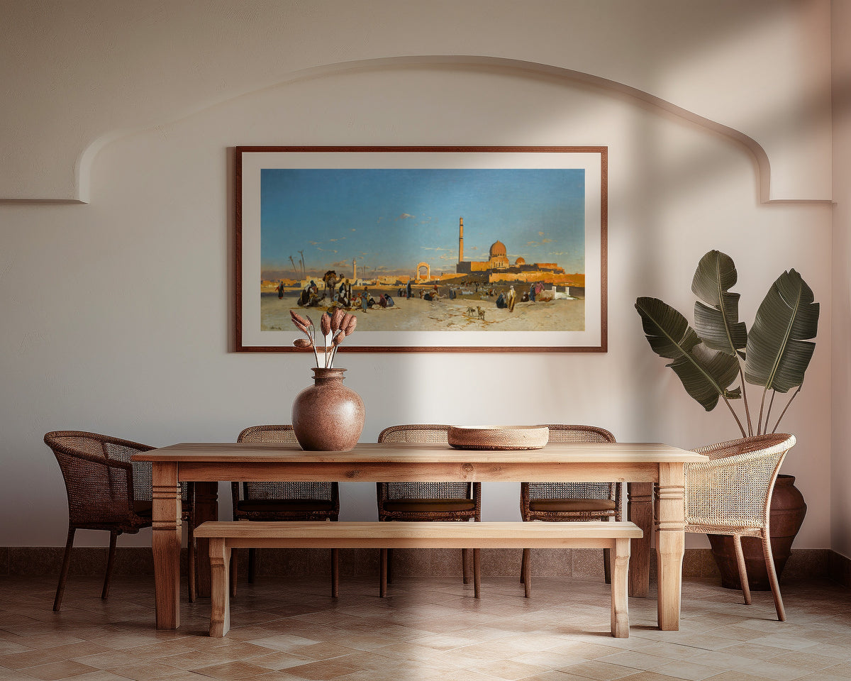 An Extensive View of Cairo by Hermann Corrodi — framed above a wooden dining table