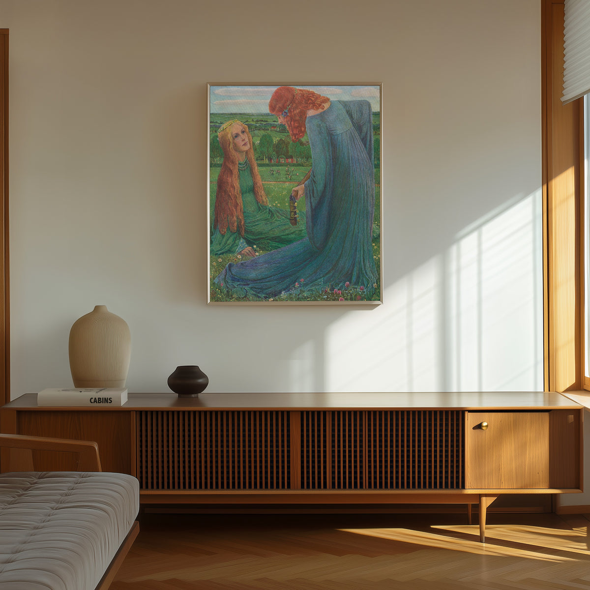 Framed art print of Annunciation by Heinrich Vogeler, in a thin light frame on a sunlit wall above a wooden sideboard