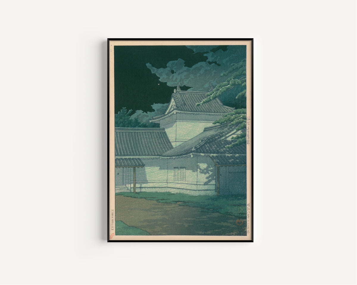 Framed art print of Aoba Castle, Sendai by Kawase Hasui, in a slim black frame on a plain white wall