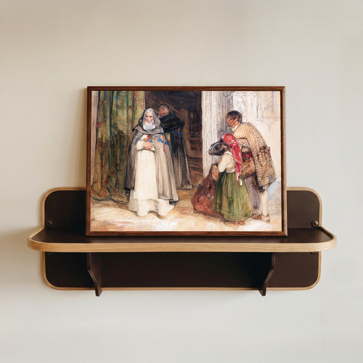 Framed art print of Asking for Alms by John Frederick Lewis, in a dark wood frame resting on a wall shelf