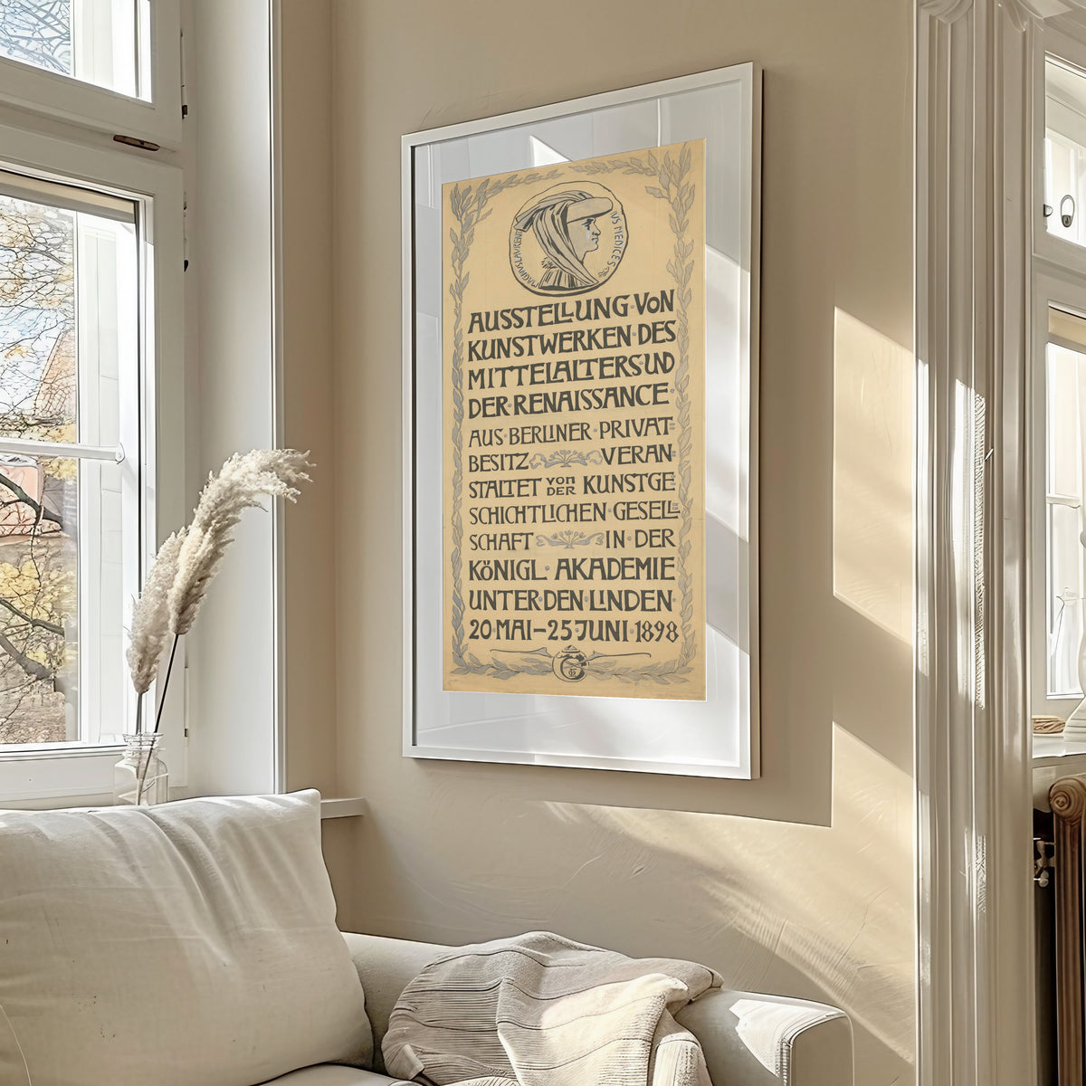 Framed art print of Ausstellung von Kunstwerken des Mittelalters und der Renaissance by Otto Eckmann, in a sunlit living room above a sofa