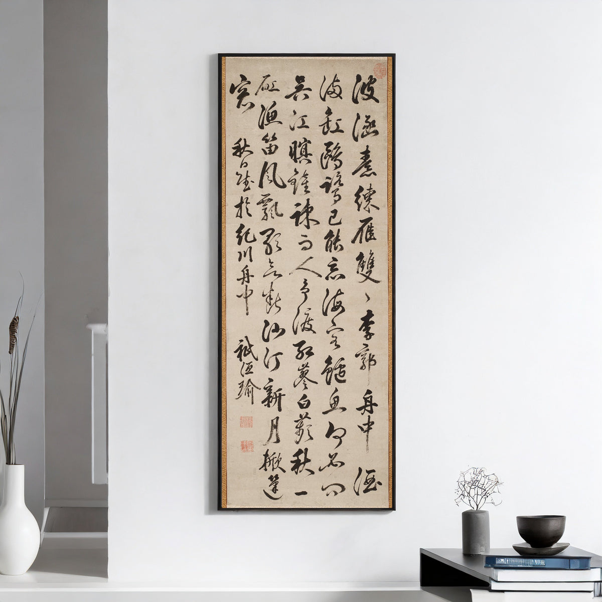 Autumn View by Gion Nankai — framed on a white wall above books and a bowl