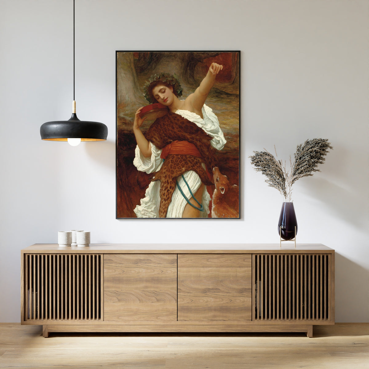 Framed art print of Bacchante by Frederic Leighton, above a slatted wood sideboard