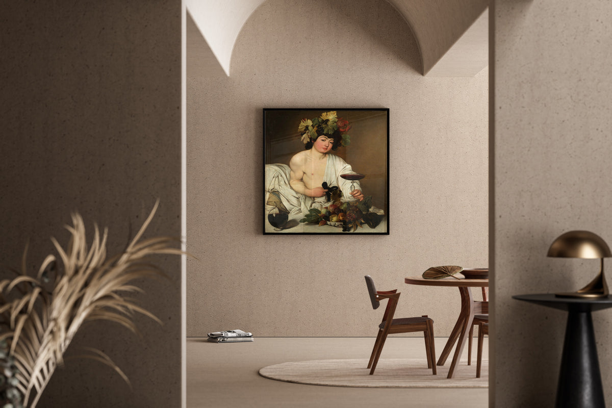 Framed art print of Bacchus by Caravaggio, in a sunlit dining corner