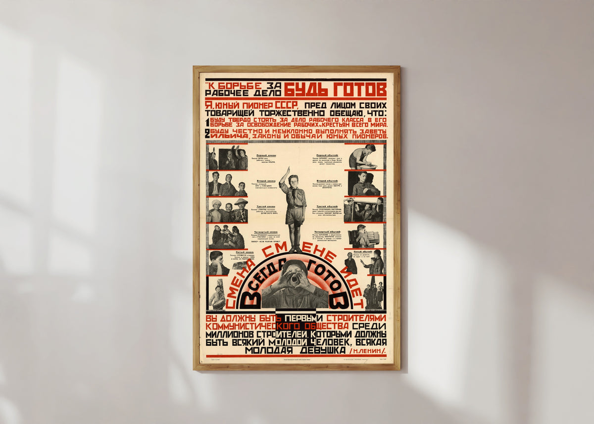 Framed art print of Be ready for the struggle for the workers' cause! Always ready! A new generation follows the…, in a light wood frame on a sunlit white wall