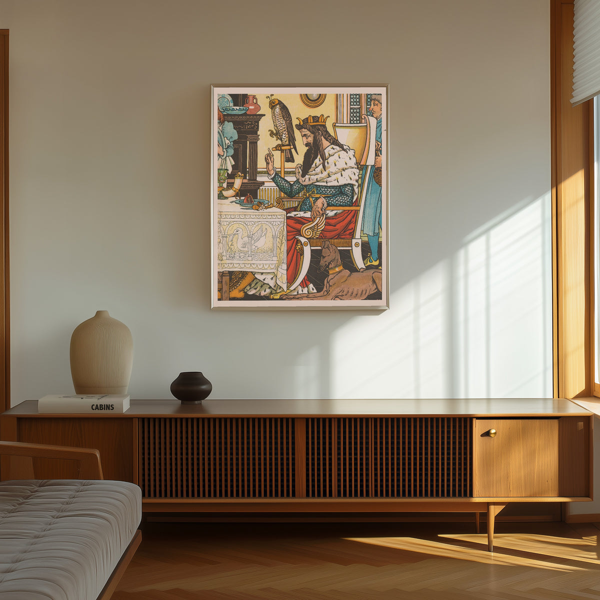 Framed art print of Beauty and the Beast: Plate 9 by Walter Crane, in a thin light frame on a sunlit wall above a wooden sideboard