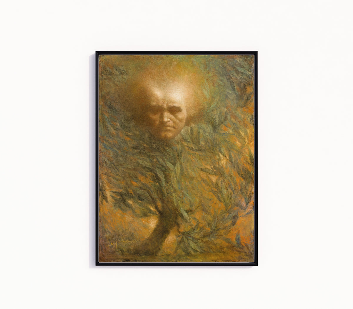 Framed art print of Beethoven Mask by Lucien Lévy-Dhurmer, in a slim black frame on a plain white wall