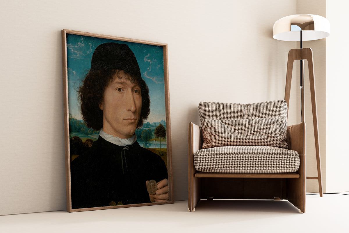Framed art print of Bernardo Bembo, Statesman and Ambassador of Venice by Hans Memling, leaning against a wall beside an armchair and a floor lamp