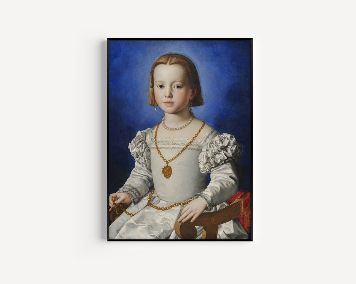 Framed art print of Bia di Cosimo de’ Medici by Bronzino, in a slim black frame on a plain white wall