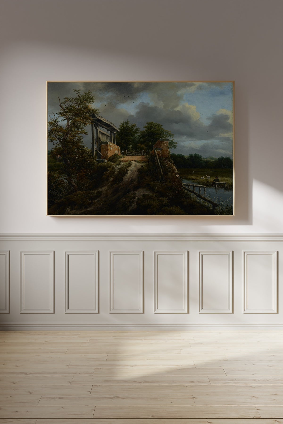 Bridge with a Sluice by Jacob van Ruisdael — framed on a panelled wall in afternoon light