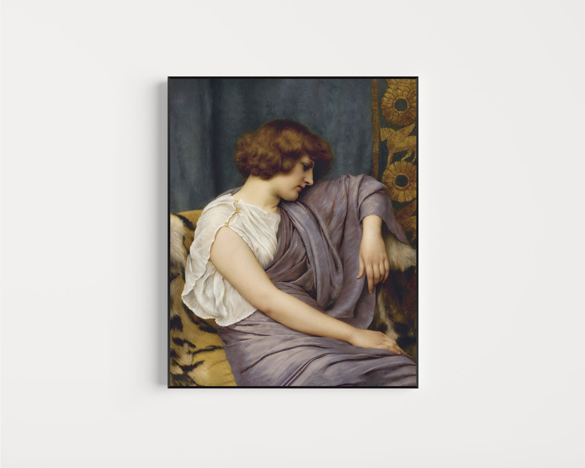 Framed art print of Briseis by John William Godward, in a slim black frame on a plain white wall