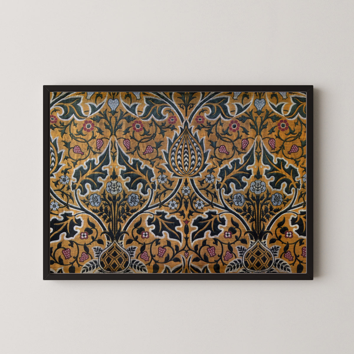 Framed art print of Brocatel by William Morris, in a black frame on a pale wall