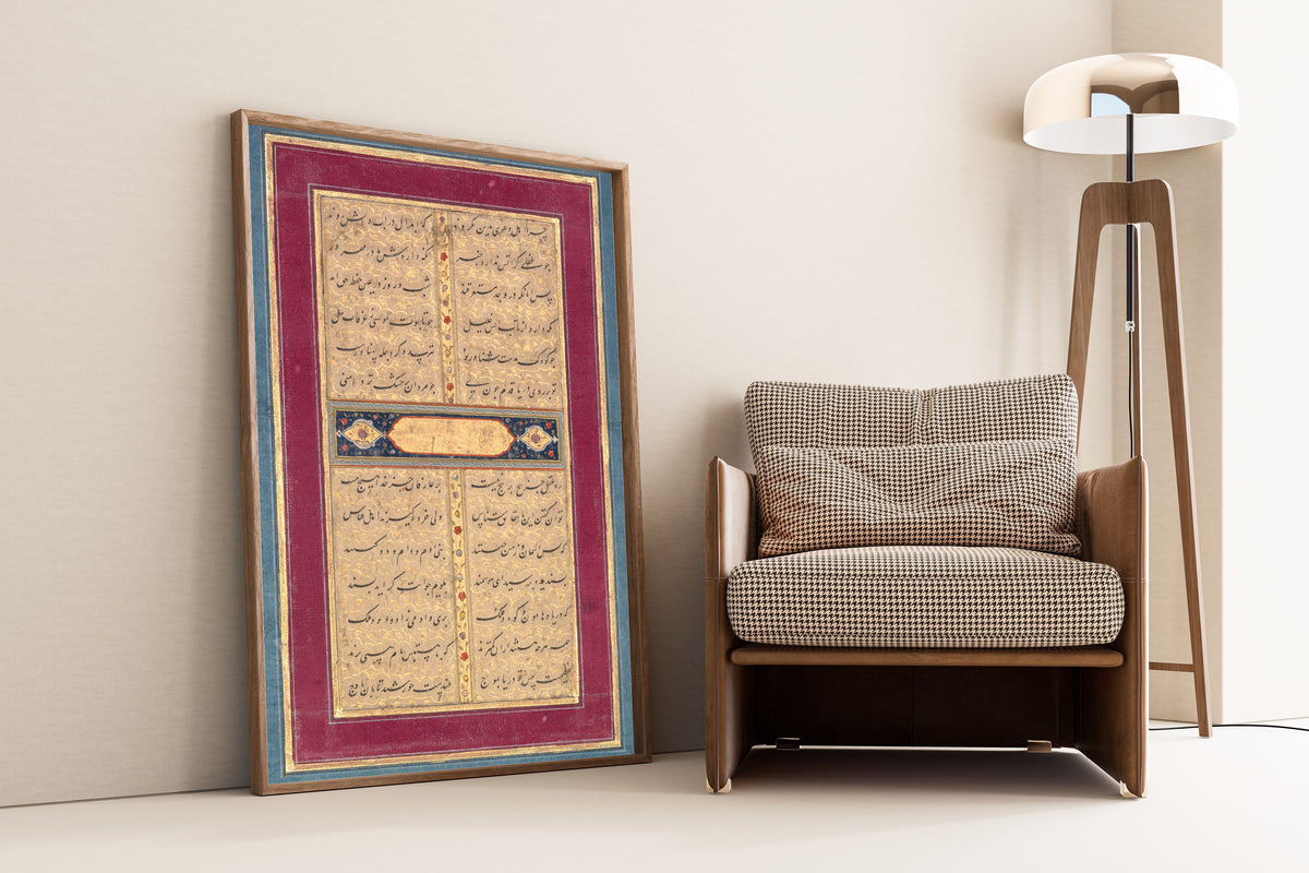 Framed art print of Bustan of Sa'di: A Page of Text, leaning against a wall beside an armchair and a floor lamp