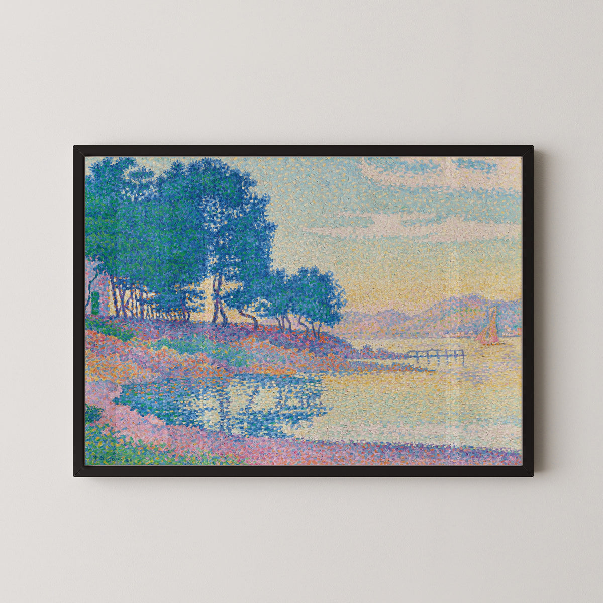 Framed art print of Calanque des Canoubiers, Saint-Tropez by Paul Signac, in a black frame on a pale wall