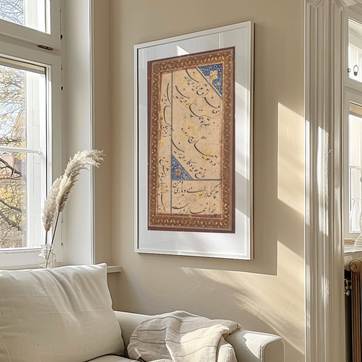 Framed art print of Calligraphy of a Ghazal of Amir Khusrau Dihlavi, in a sunlit living room above a sofa