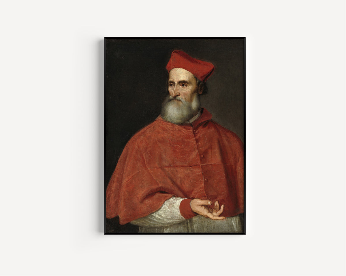 Framed art print of Cardinal Pietro Bembo by Titian, in a slim black frame on a plain white wall