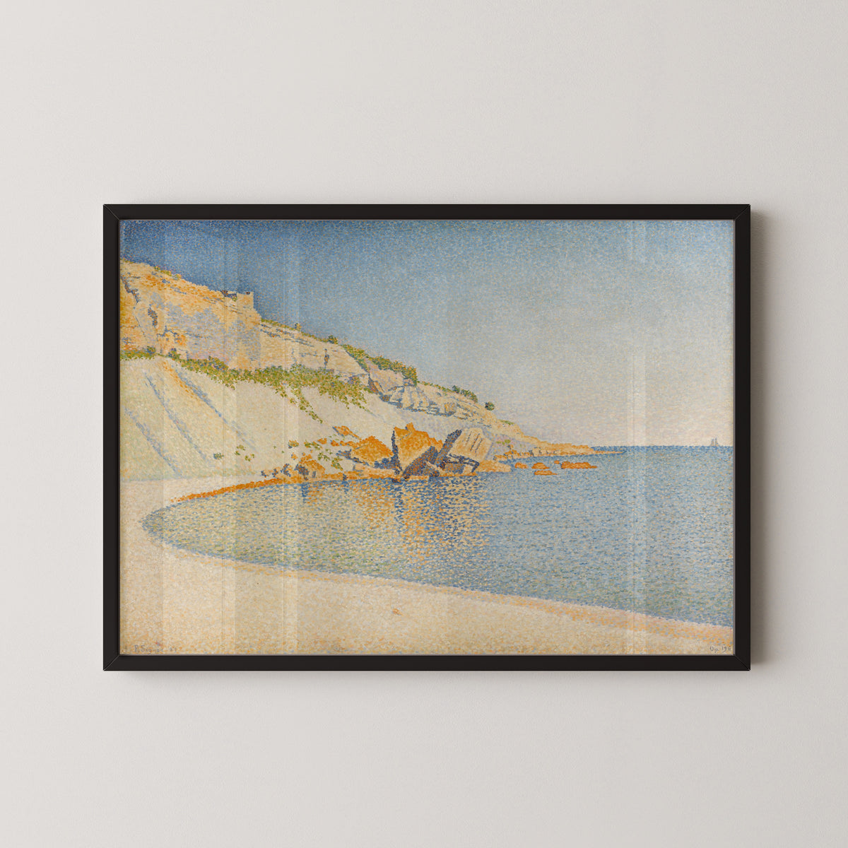 Framed art print of Cassis, Cap Lombard, Opus 196 by Paul Signac, in a black frame on a pale wall
