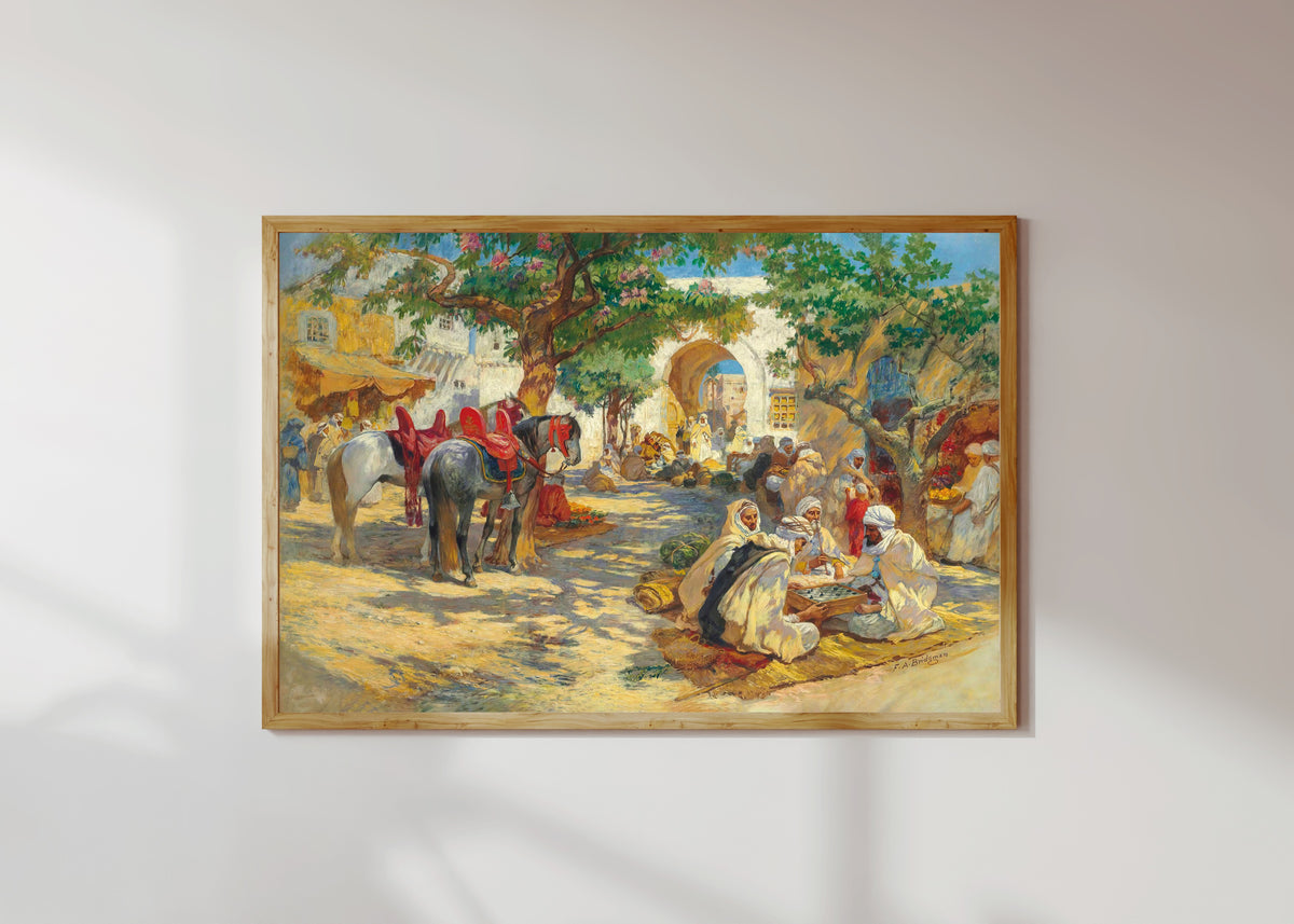 Framed art print of Chess Players, Biskra by Frederick Arthur Bridgman, in a light wood frame on a sunlit white wall