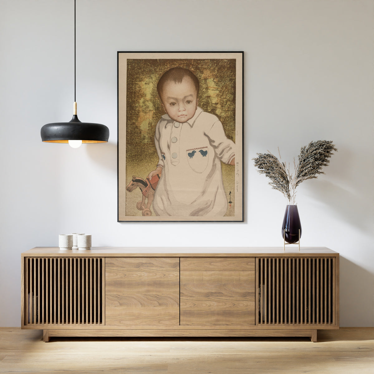 Framed art print of Child by Hiroshi Yoshida, above a slatted wood sideboard