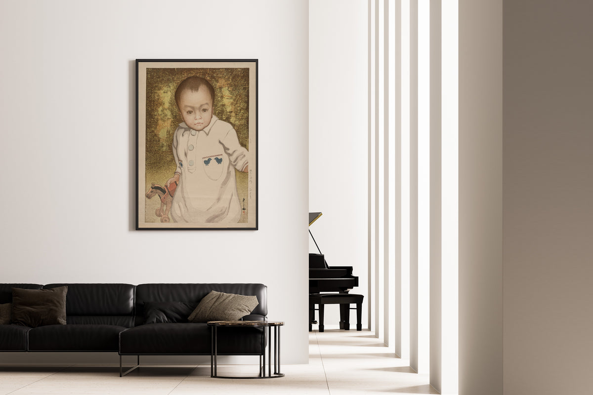 Framed art print of Child by Hiroshi Yoshida, on the wall of a minimal living room