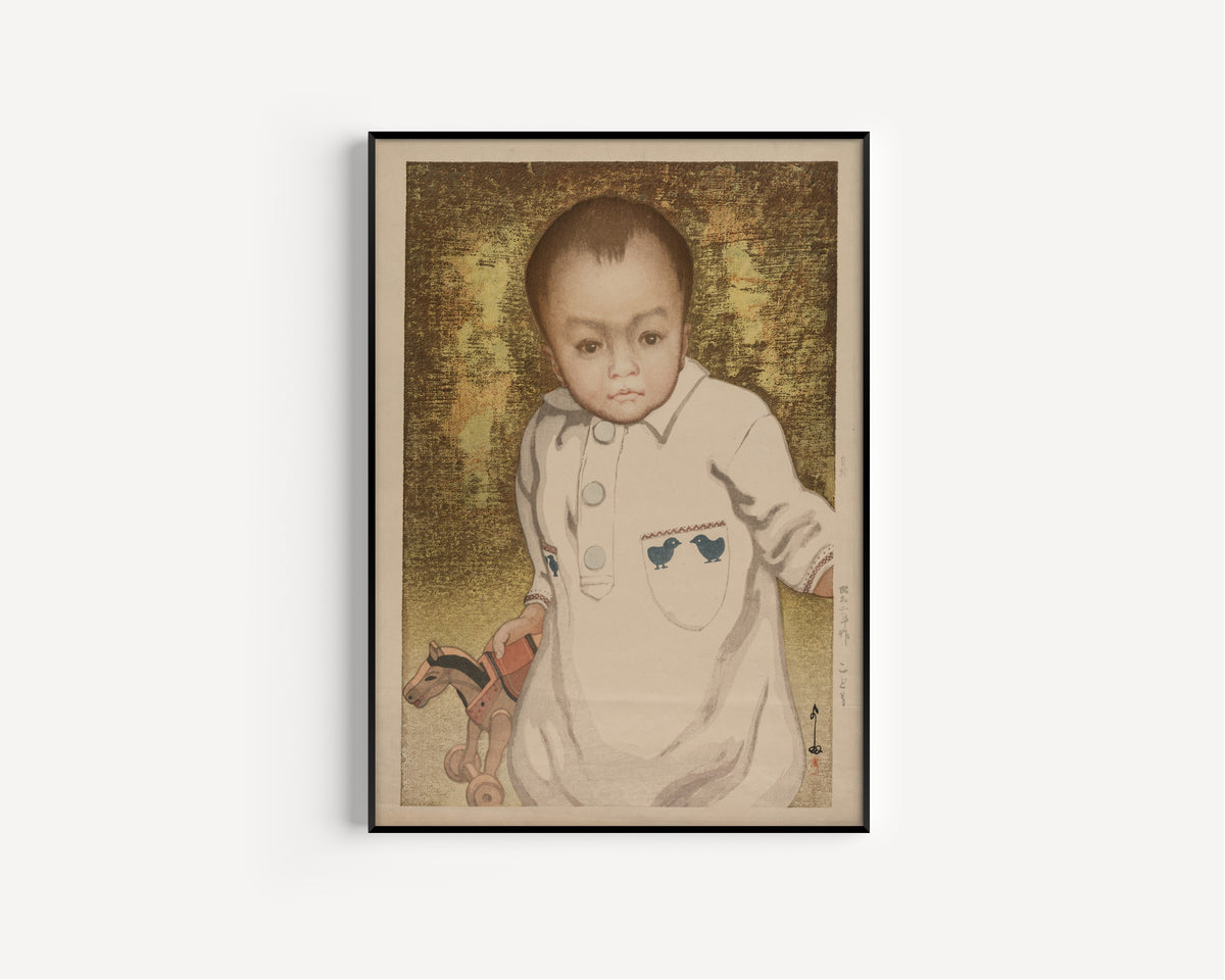 Framed art print of Child by Hiroshi Yoshida, in a slim black frame on a plain white wall