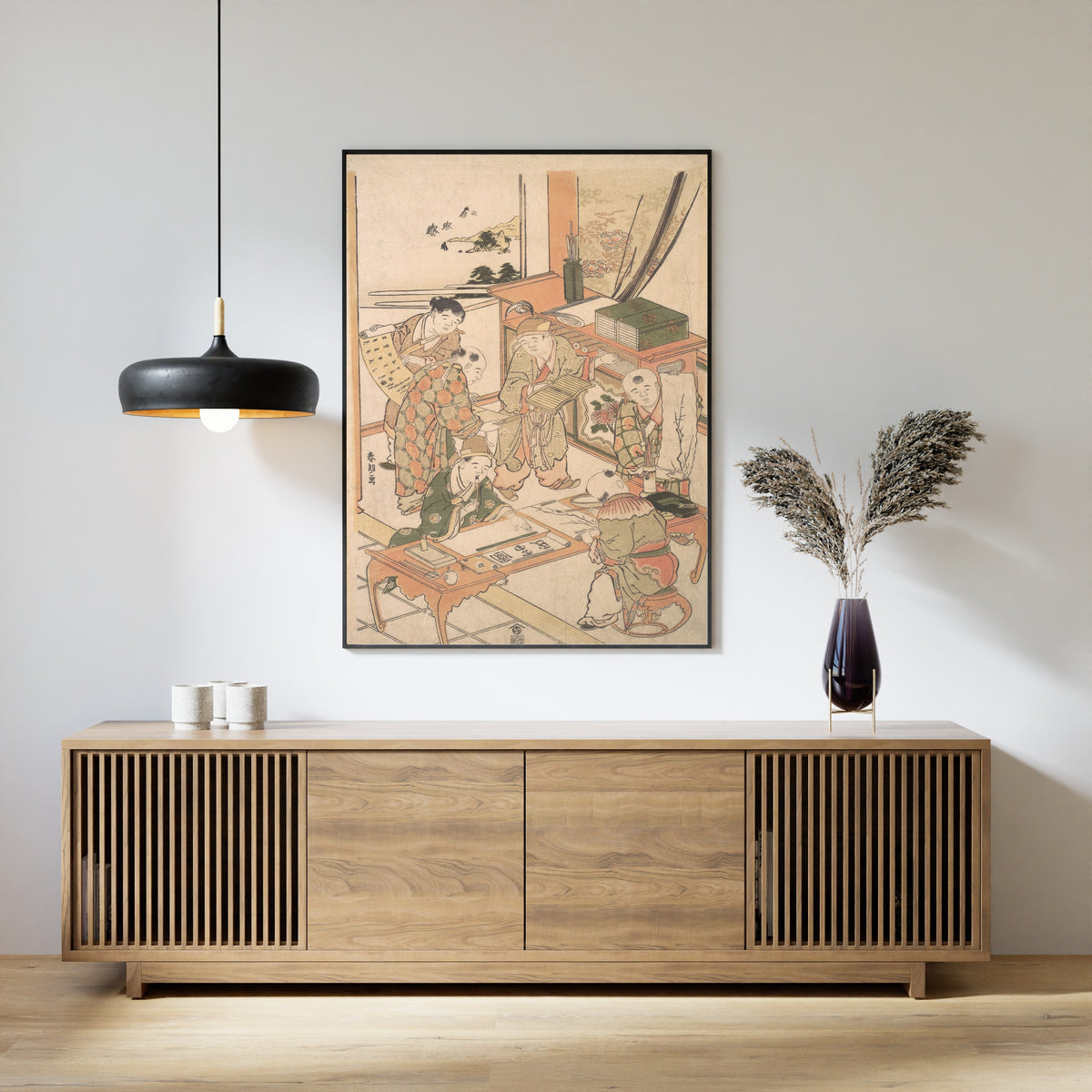 Framed art print of Chinese Boys Learning to Write and Paint by Katsushika Hokusai, above a slatted wood sideboard
