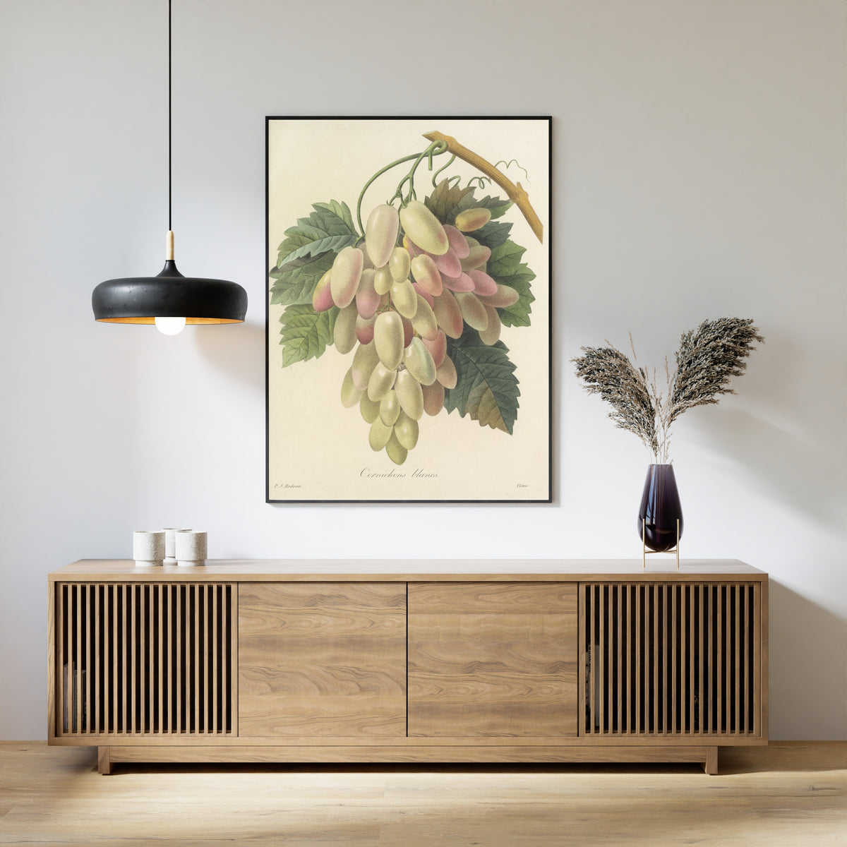 Framed art print of Choix des plus belles fleurs, Plate 27: Cornichons Blancs by Pierre-Joseph Redouté, above a slatted wood sideboard