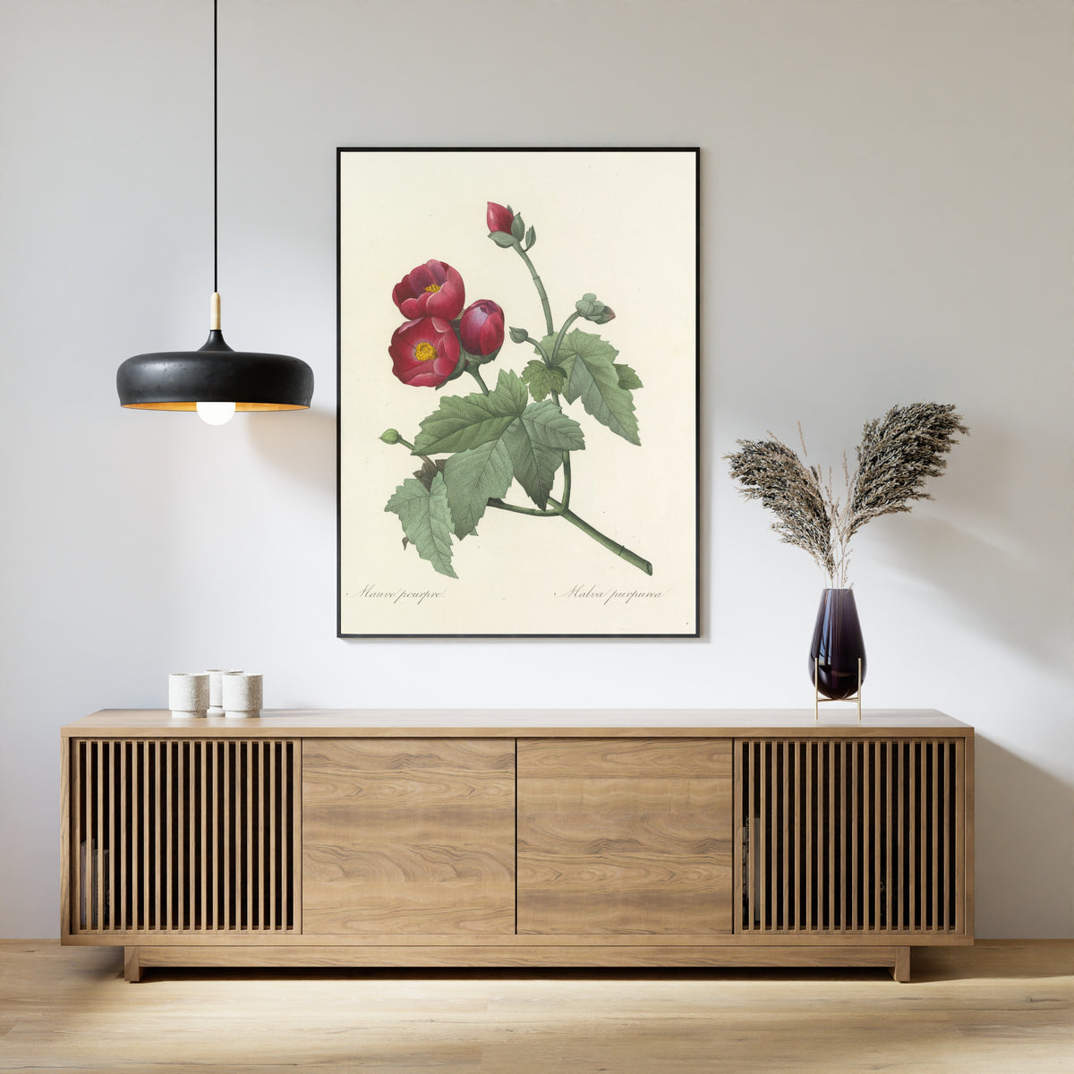 Framed art print of Choix des plus belles fleurs, Plate 47: Malva Purpurea by Pierre-Joseph Redouté, above a slatted wood sideboard