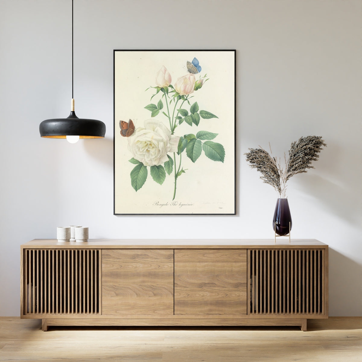 Framed art print of Choix des plus belles fleurs, Plate 92: Bengale Thé Hyménée by Pierre-Joseph Redouté, above a slatted wood sideboard