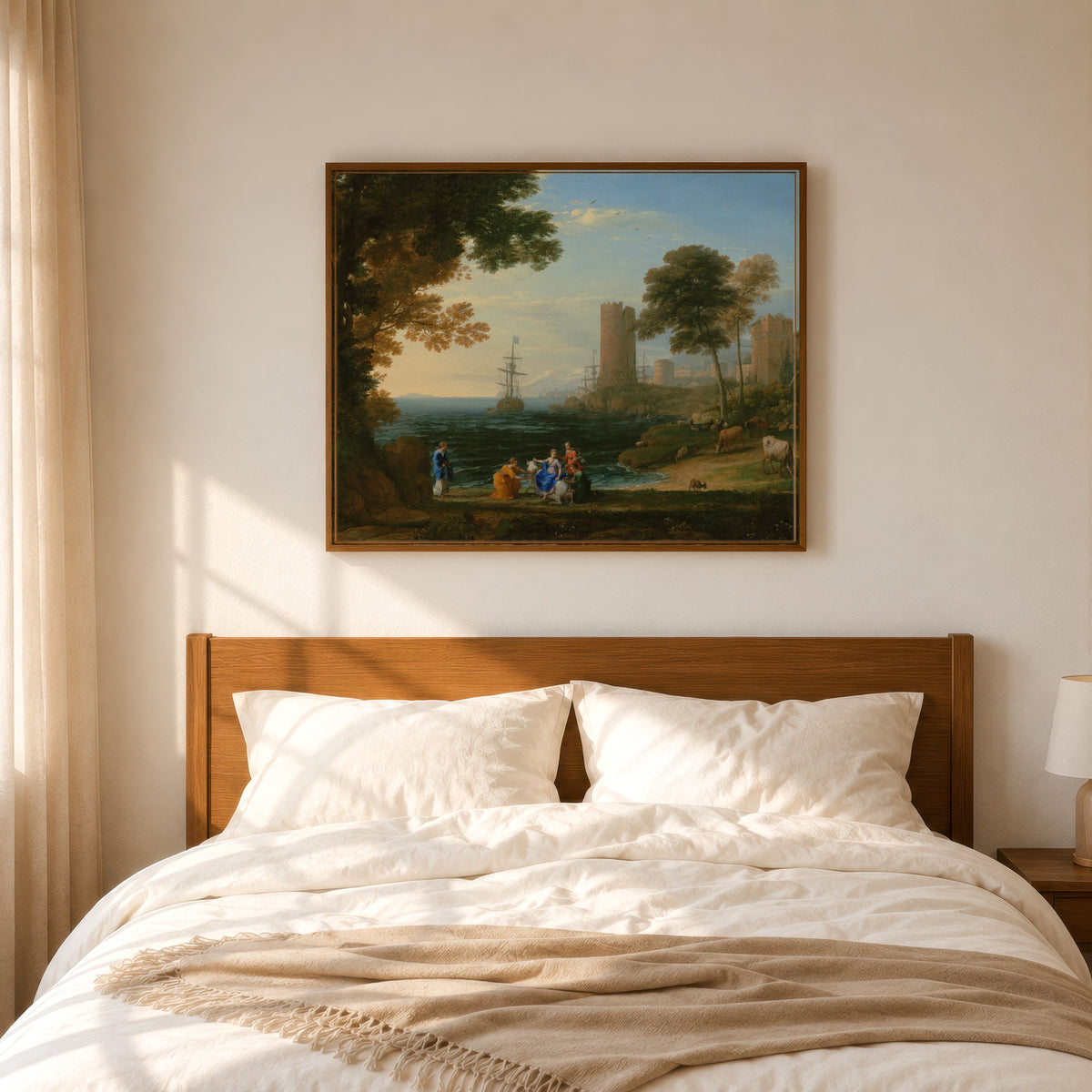 Framed art print of Coast View with the Abduction of Europa by Claude Lorrain, in a slim wood frame above a bed in a sunlit bedroom