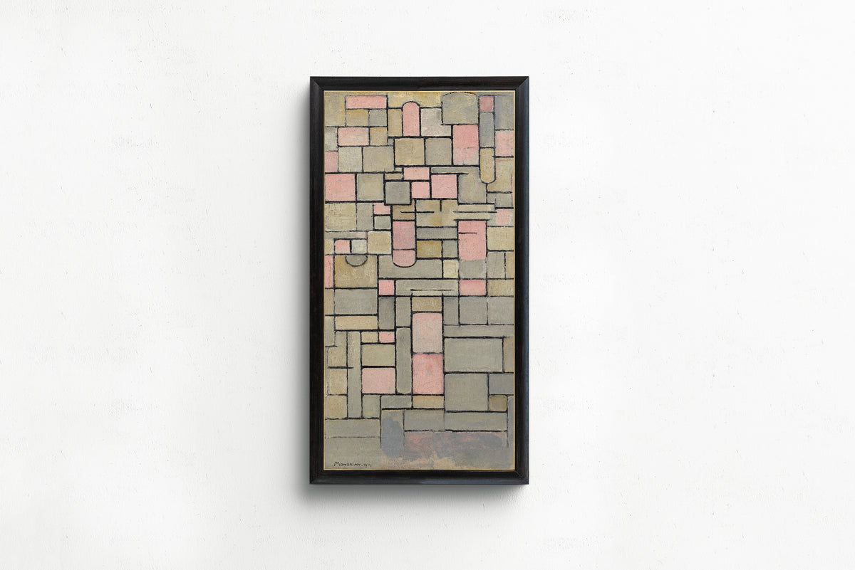 Framed art print of Composition 8 by Piet Mondrian, in a slim black frame on a plain white wall
