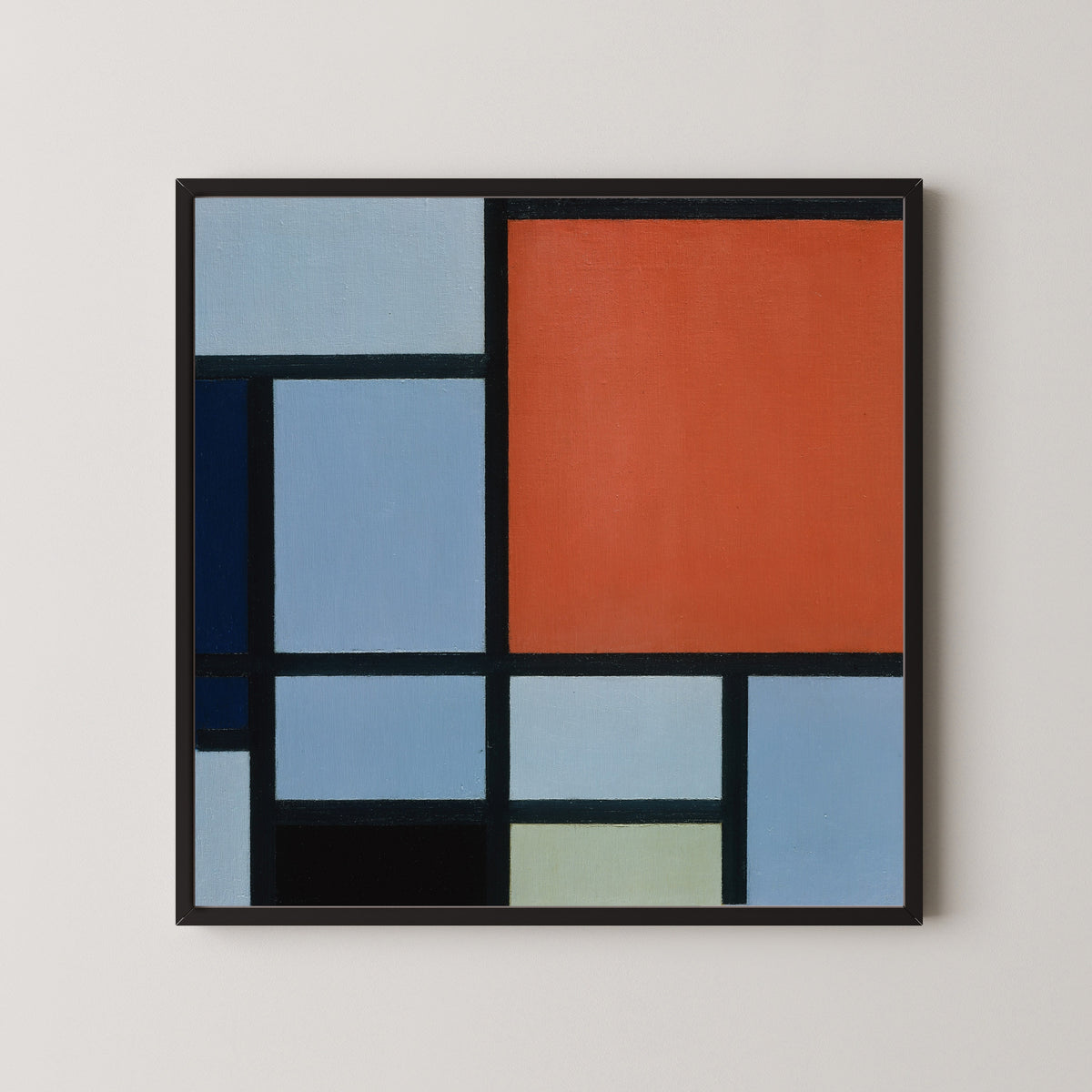Framed art print of Composition (Red and Grey-Blue) by Piet Mondrian, in a black frame on a pale wall