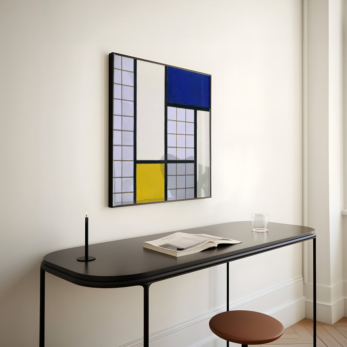 Framed art print of Composition in Half-Tones by Theo van Doesburg, above a slim black console table