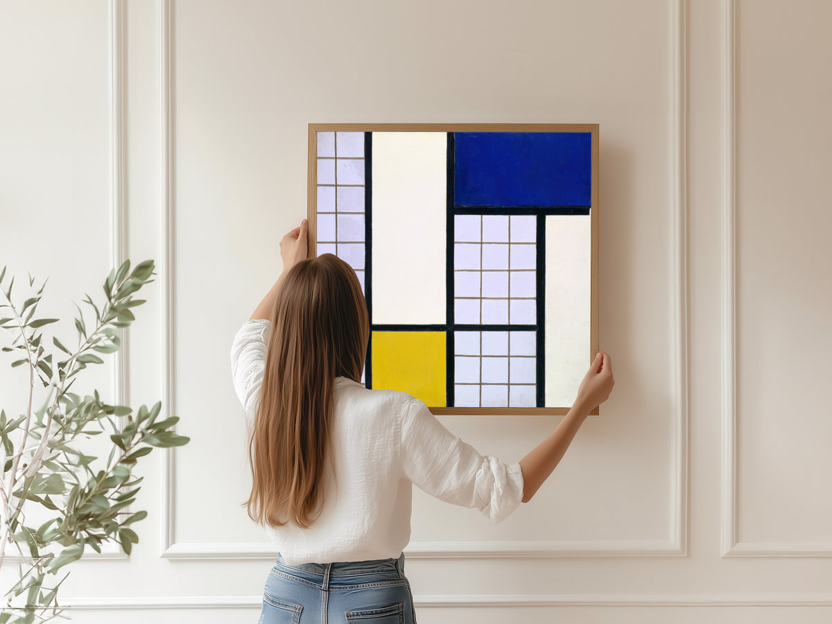 Framed art print of Composition in Half-Tones by Theo van Doesburg, hung on a panelled wall