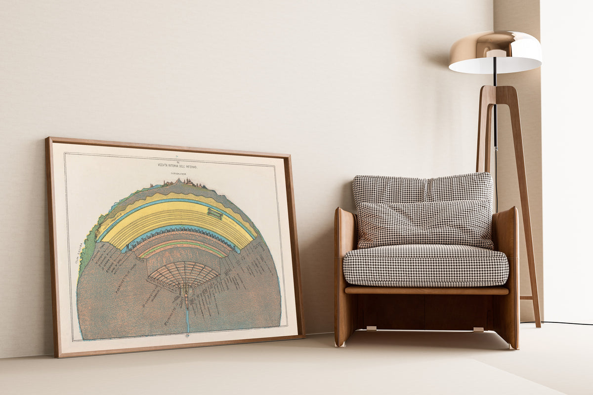 Cross Section of Hell by Michelangelo Caetani — framed and leaning against a wall beside an armchair and a floor lamp